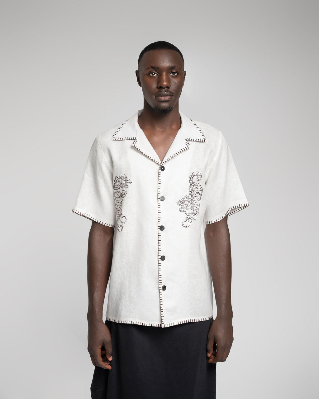 Crouching Tiger - White w / dark brown embroidery