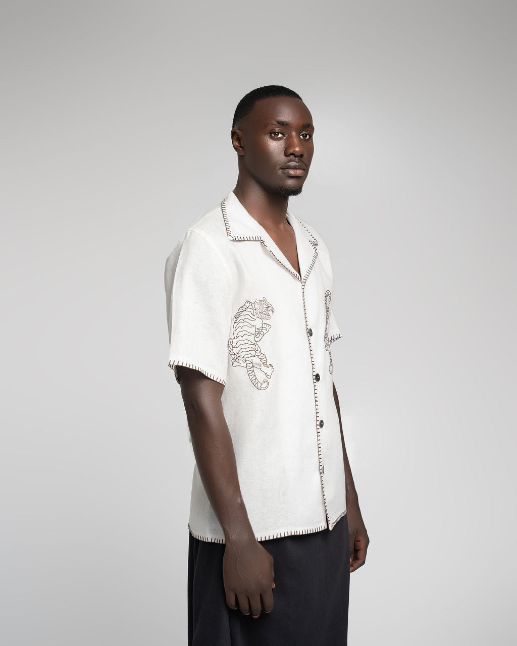 Crouching Tiger - White w / dark brown embroidery